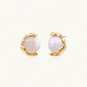 Gold vermeil studs with lustrous pink freshwater pearls in organic crescent settings