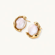 Gold vermeil studs with lustrous pink freshwater pearls in organic crescent settings