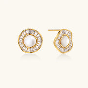 Round 14K gold-plated stud earrings with a mother of pearl center surrounded by baguette-cut crystals, 16mm.