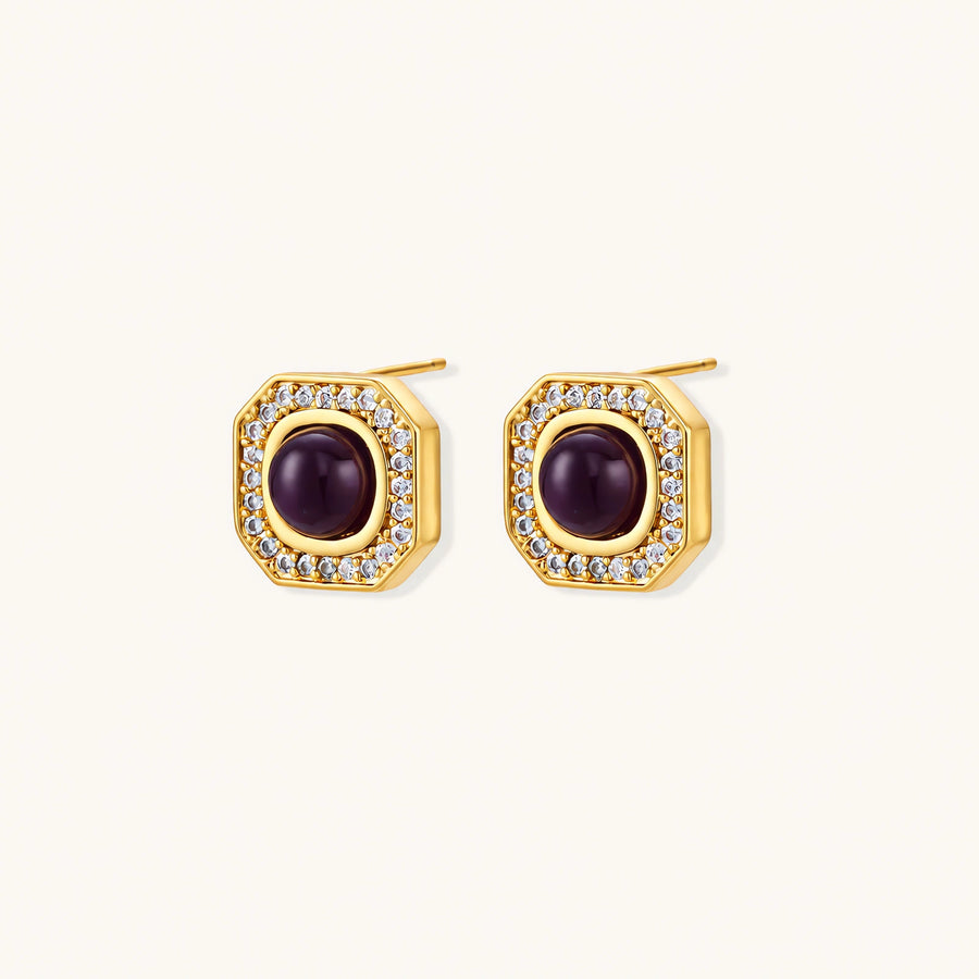 Gold-plated octagonal stud earrings with burgundy liuli centers and cubic zirconia halos on white background
