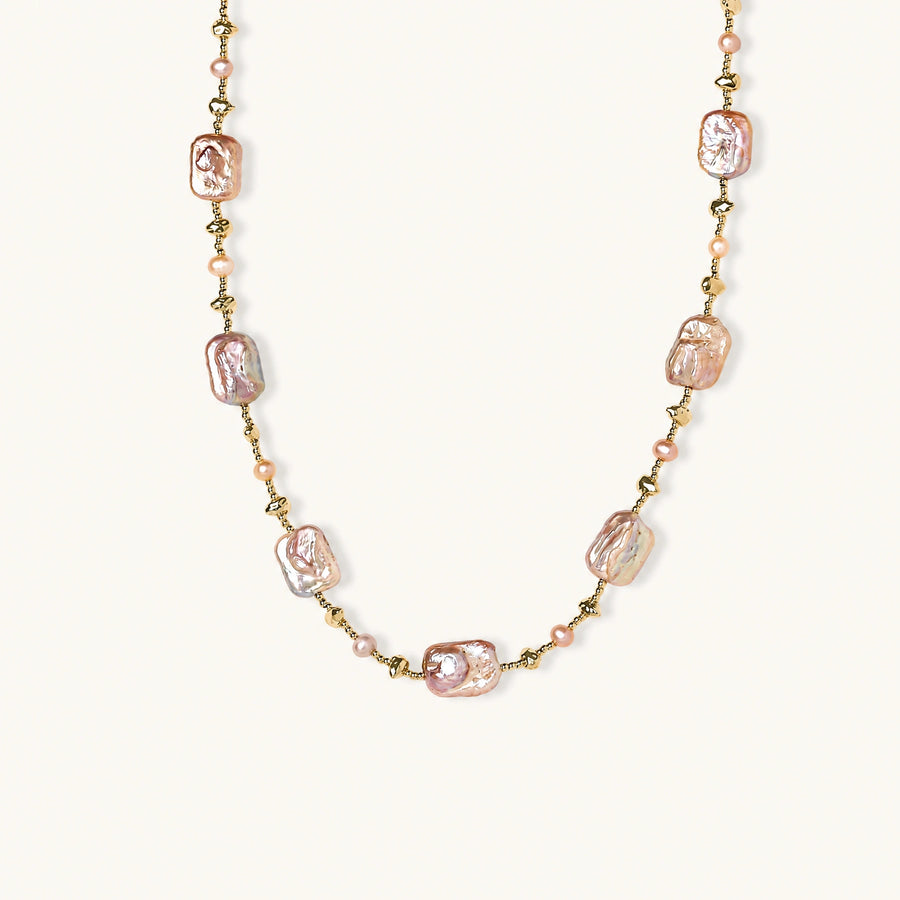 Iridescent baroque pearls alternating with small freshwater pearls on 14K gold-plated chain
